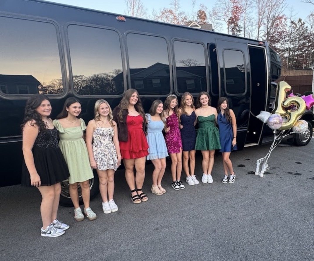 Sweet 16 celebration group beside a Play-It-Safe party bus