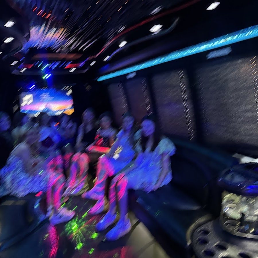 Group celebration aboard a Play-It-Safe party bus