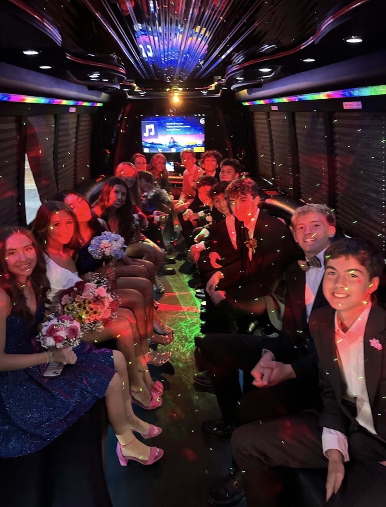 Homecoming group aboard a Play-It-Safe party bus in Atlanta